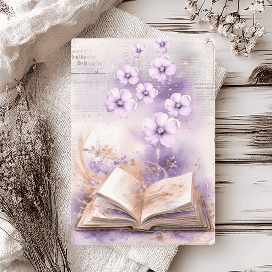 A5 greetings card featuring a book and purple flowers with script writing in the background