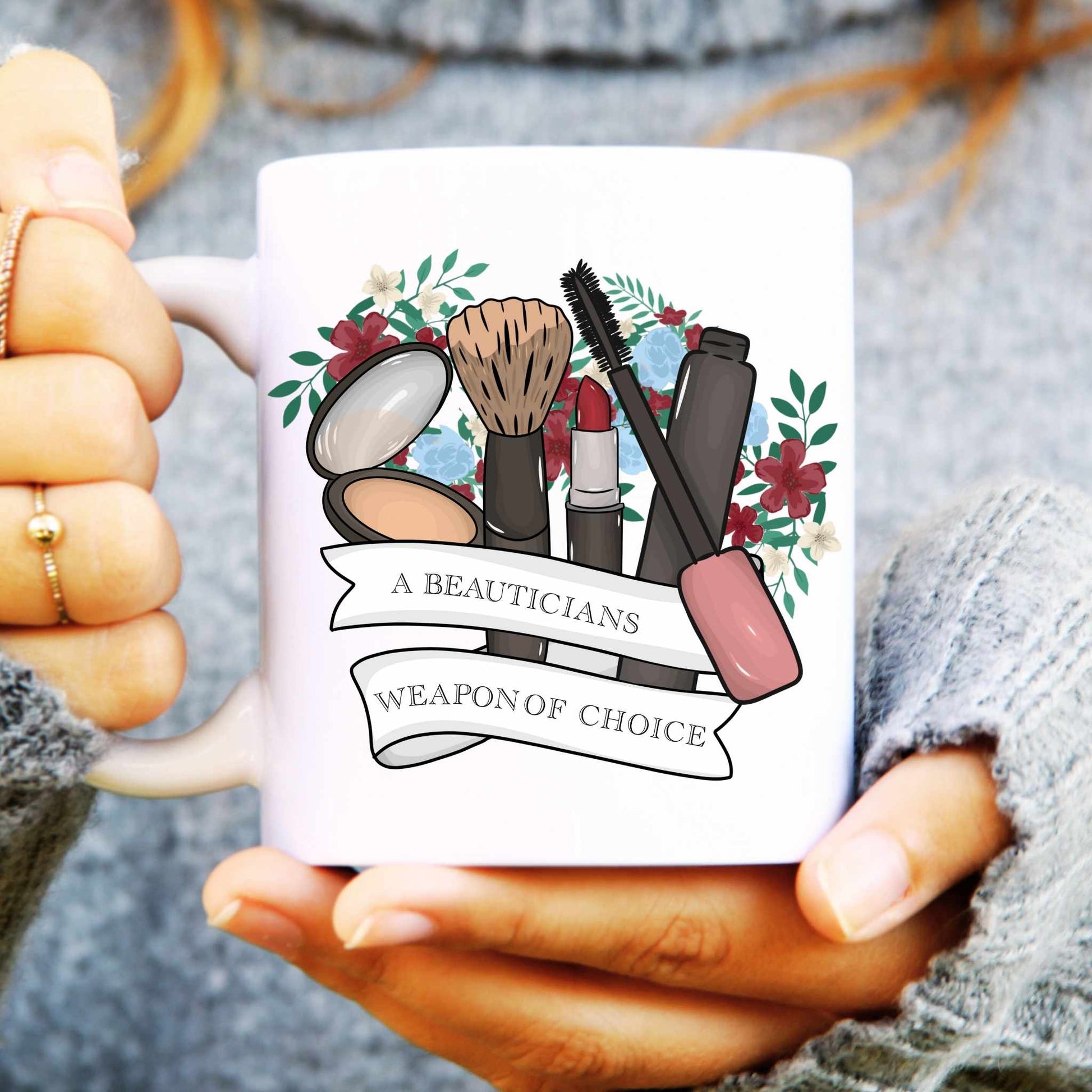 Mug with cosmetic illustrations and text held by a person