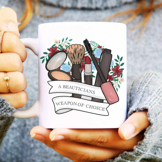 Mug with cosmetic illustrations and text held by a person