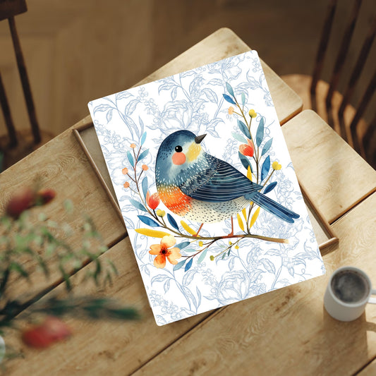 A4 print with a bird illustration on a wooden table