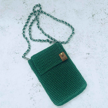 Full view of handmade bottle green phone back with silver and green strap