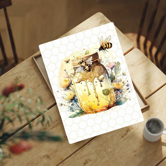 pretty bee print with honeycomb jar and background, on a wooden table