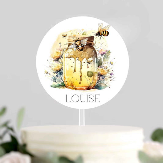 personalised cake topper with two honey bees and the name Louise to show personalised option