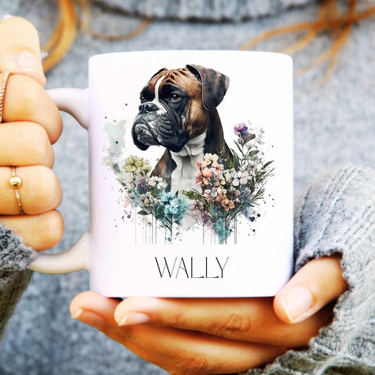 Person holding a mug with a boxer dog illustration and the name 'Wally' 