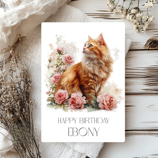 Greeting card with a cat and flowers on a wooden surface personalised with Happy Birthday Ebony