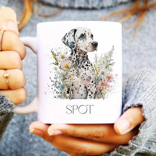 Person holding a mug with a Dalmatian dog illustration and the name 'Spot'.