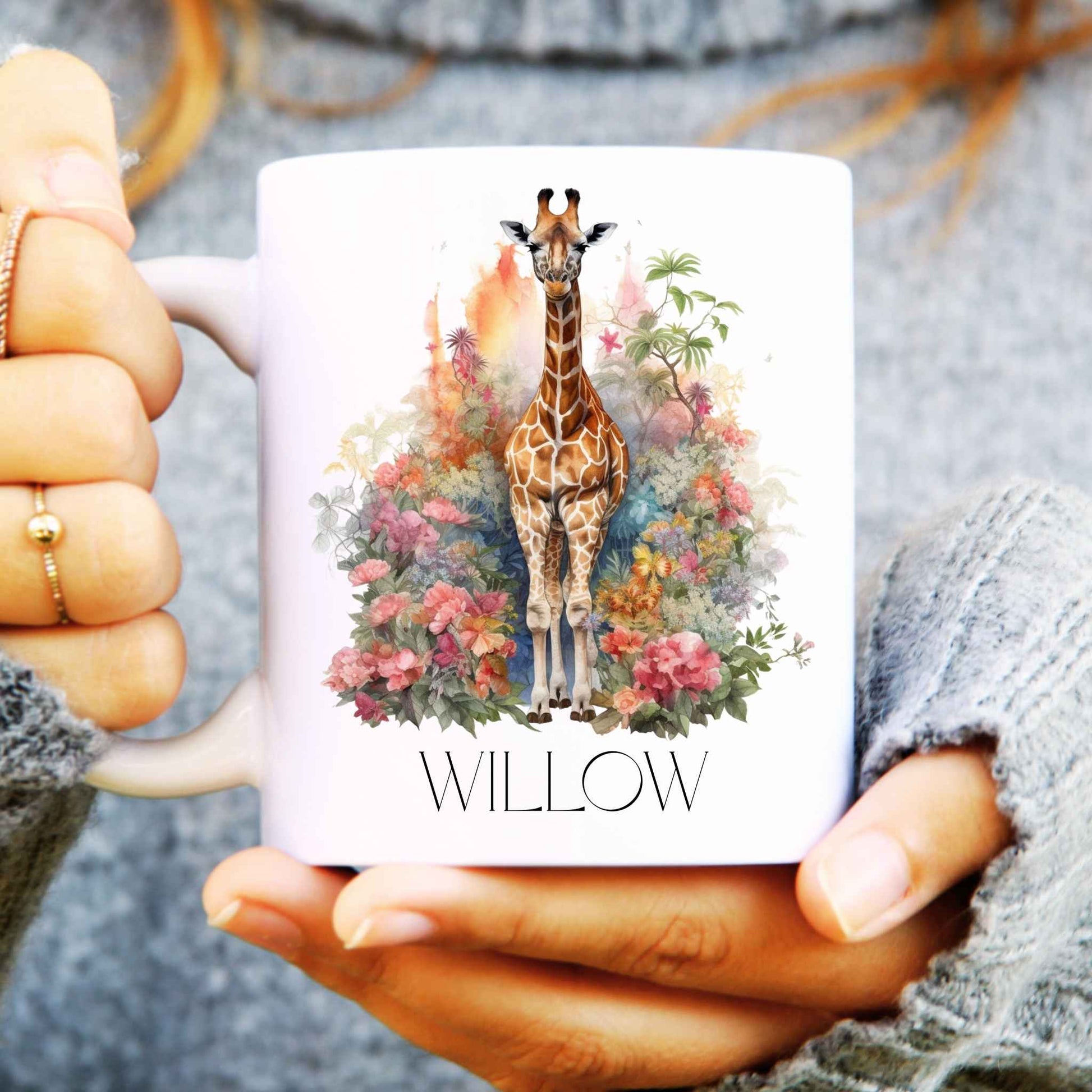 Giraffe watercolour design on a ceramic coffee mug and personalised at the bottom.