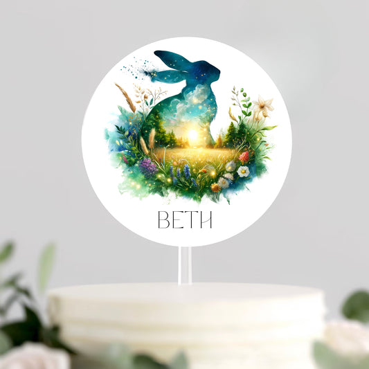 A delightful cake adorned with a hare and the name "Beth," showcasing a charming personalised hare cake topper.