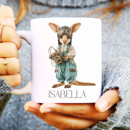 Coffee mug being held in hands with steampunk kangaroo design and a name personalised onto it.