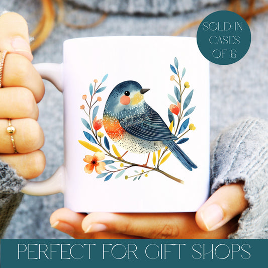 White mug with a colourful bird design held by a person, with text about cases of 6 and gift shops, wholesale products.