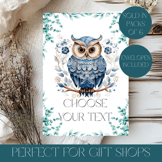 Greeting card with a blue owl design on a white background, surrounded by decorative elements. Pack Of 6 Wholesale